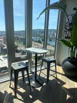 Circle pedestal table. $45 obo Adjustable height. (Stools sold separately)