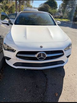 Mercedes-Benz White Sedan
