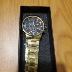 GENEVA  MENS GOLD COLOR FLEXABLE BAND WATCH INSIDE DOWELS ARE FOR SHOW ONLY