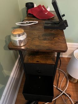 Bedside table with power outlets