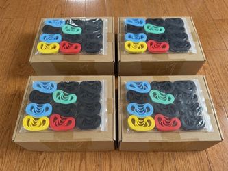 Lot of 4 pack of 240 silicone wristbands printed with Christian Bible verses and faith-based motivational phrases. Each pack has 60 counts