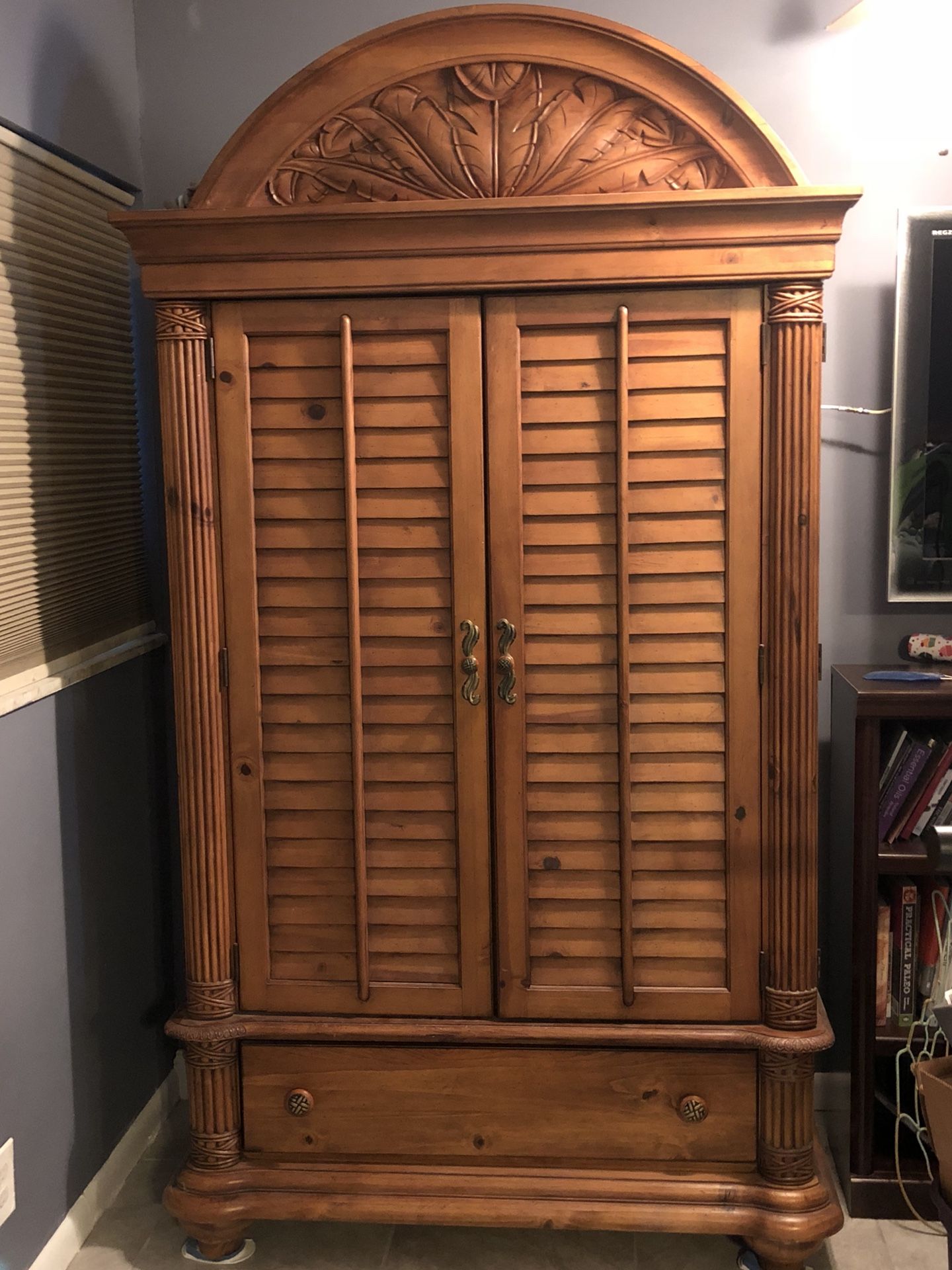 Palm court armoire for clothing and matching dresser.