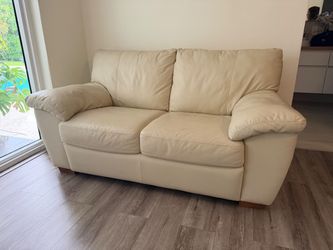 Cream Loveseat Sofa – Good Condition  W 62”