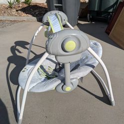 Ingenuity Soothe 'n Delight Portable Swing with music and 6 speed 