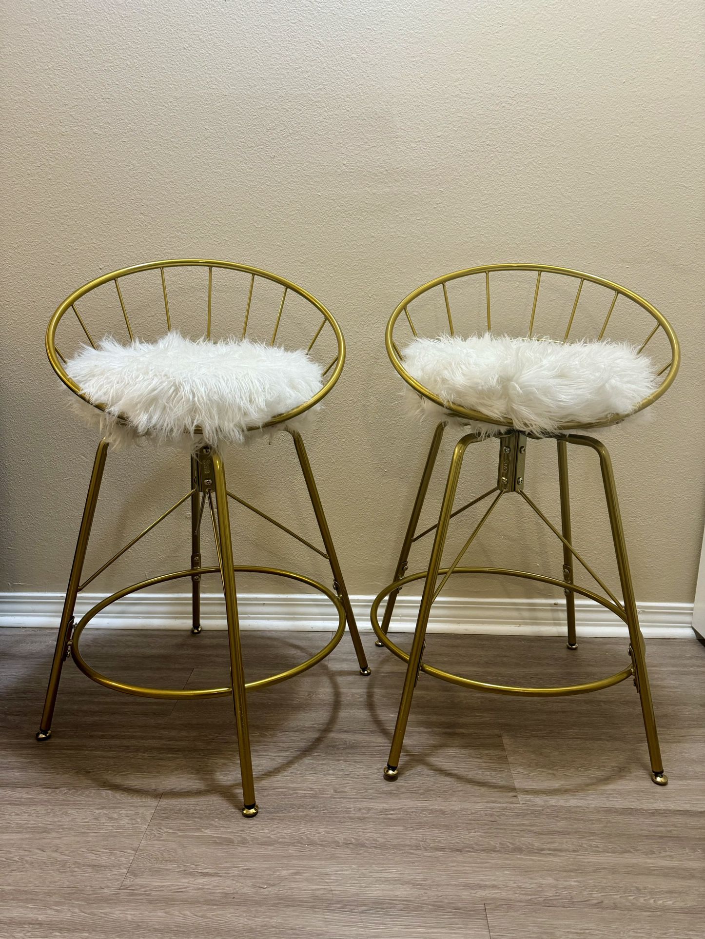 Pair of Golden Barstools with rotating fur seats