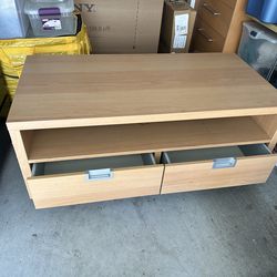Tv stand with 2 drawers.
