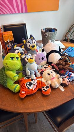 Collections of kids stuffy animals and toys