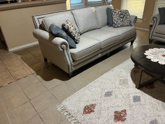 Gray Fabric Sofa with Nailhead Trim