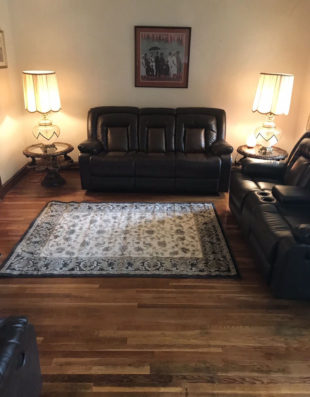 Gently used brown reclining leather couches and recliner chair