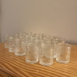 61 votives and ~100 battery tea lights 