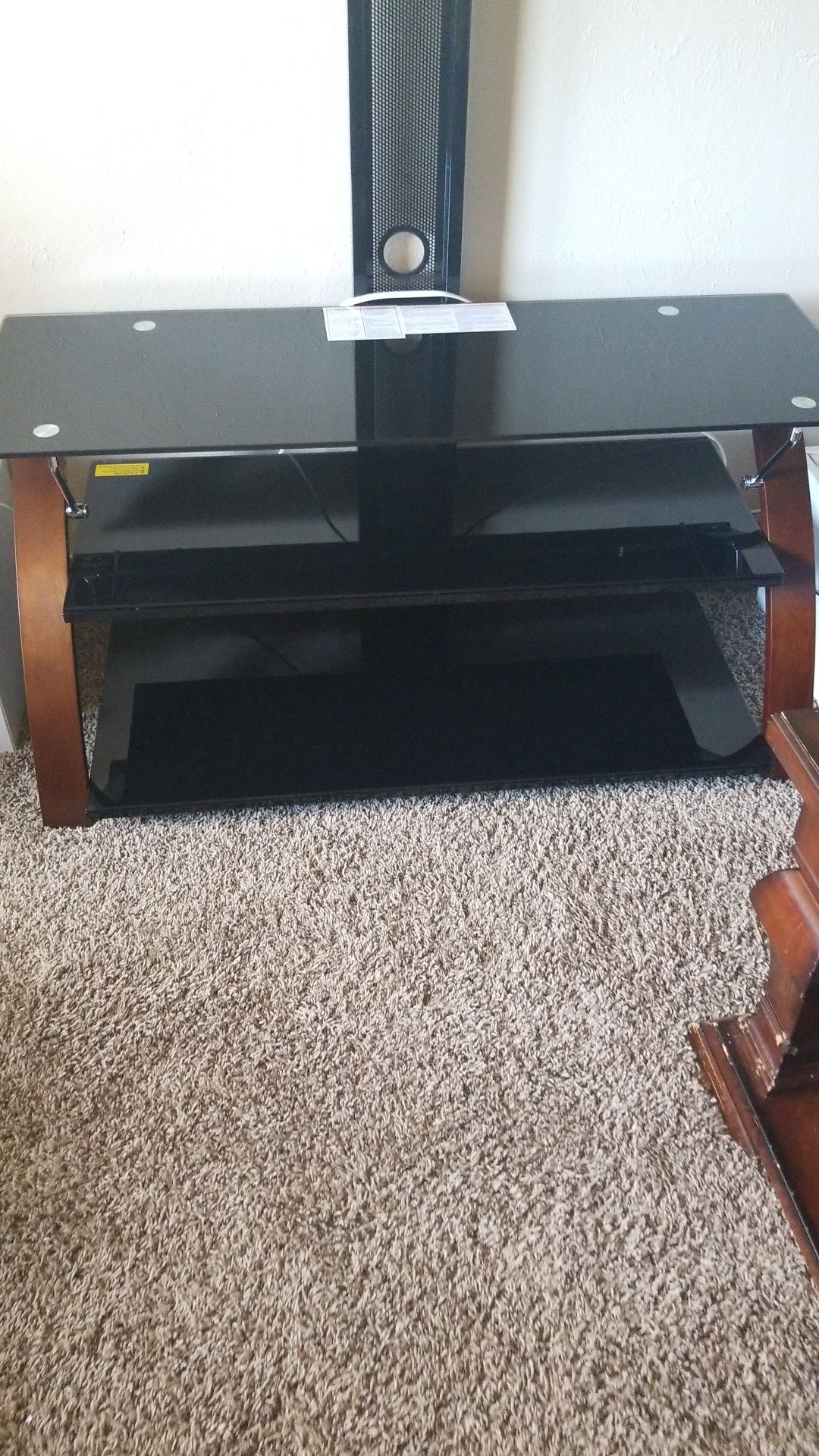 TV stand holds up to 55"