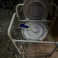 Drive brand folding steel bedside commode