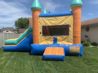 Inflatable jumping slide