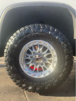 18” Km558 machine silver 8x180 wrapped in 37” Toyo rt trail