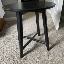 Circular wooden end table