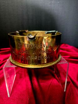 Vintage military trench art, specifically an ashtray from  decommissioned large-caliber Shell Casing