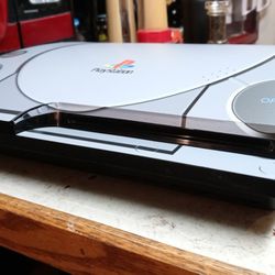 Hacked PS3 Slim With Games Loaded Etc. (PS1 Skin)