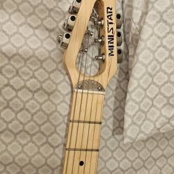 Mini Star. Electric Travel Guitar