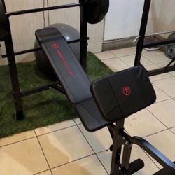 Gym Equipment Adjustable Bench press, barbell, leg developer and 100lbs of weight