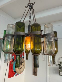 Wrought iron wine bottle chandelier