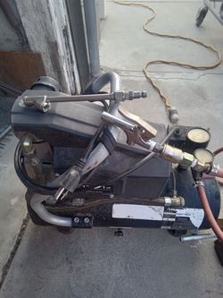 Air Compressor With 50 feet of Air Hose and Wall Mount For Easy windup and Two Attachments
