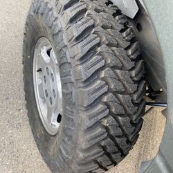 Chevy Stock Wheels And  All Terrain Tires $800 Firm