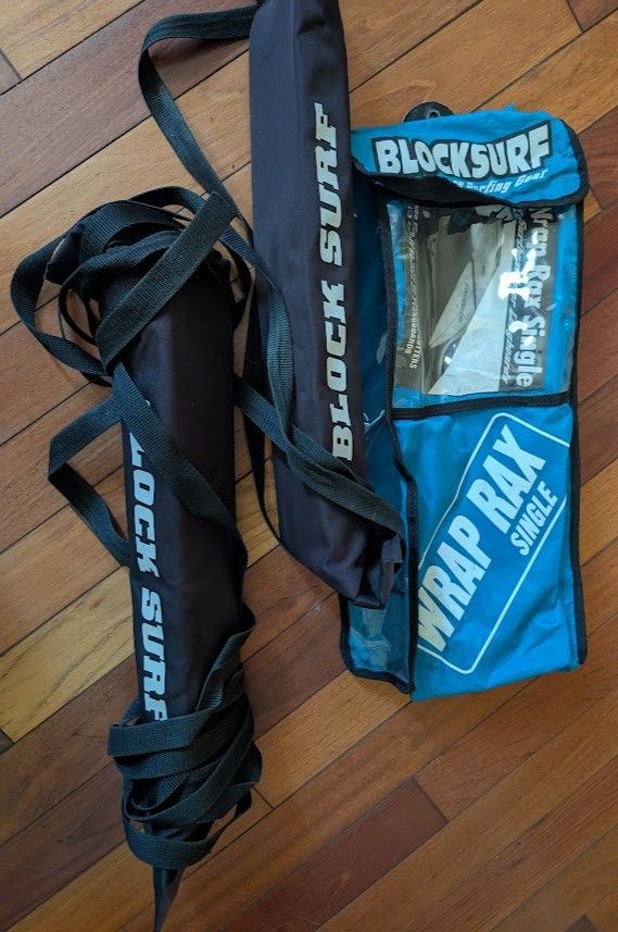 block surf wrap rax car rooftop rack soft surfboard strap-down board carrier