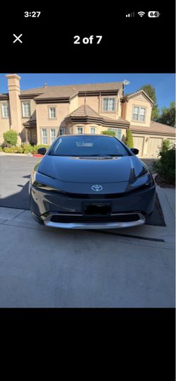 2023 Toyota Prius prime XSE with 22,000 miles