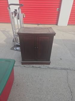 Dark Wood Two-Door Storage Cabinet