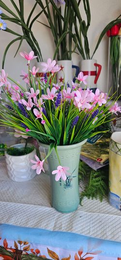 Pink tiny flowers in oriental base.