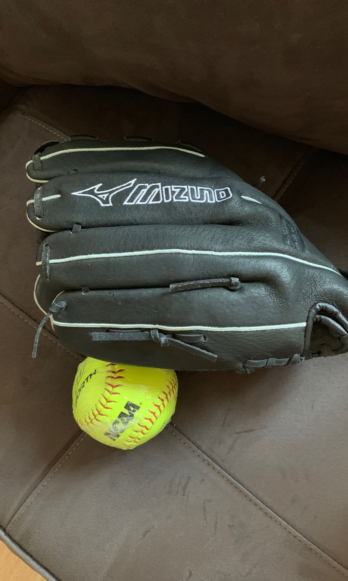 New softball glove and ball