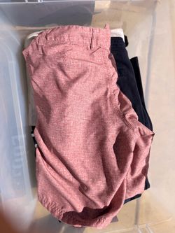 Bin of men’s clothes (used)