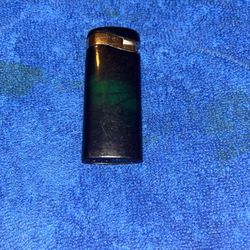 Vintage Green Butane Lighter With Warning Label