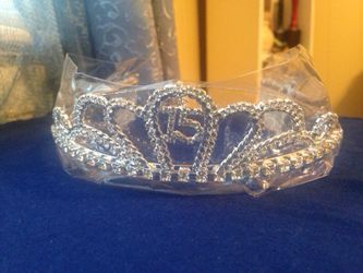 Tiara with #15 charm. This charm can be removed.