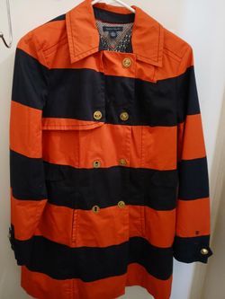 Women's knee length trench coat size medium.