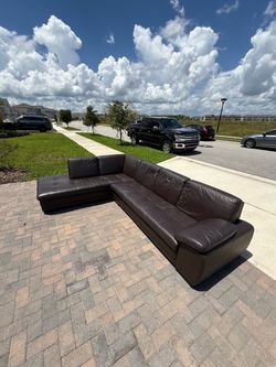 Real Leather Sectional- delivery available