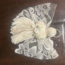 Antique Christmas tree ornament of an angel hand