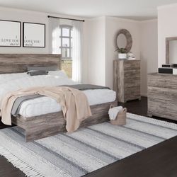 Ralinksi Gray Panel Bedroom Set