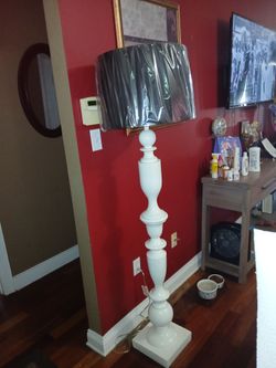 6ft white pedestal lamps with shade. Purchased from Rooms to Go