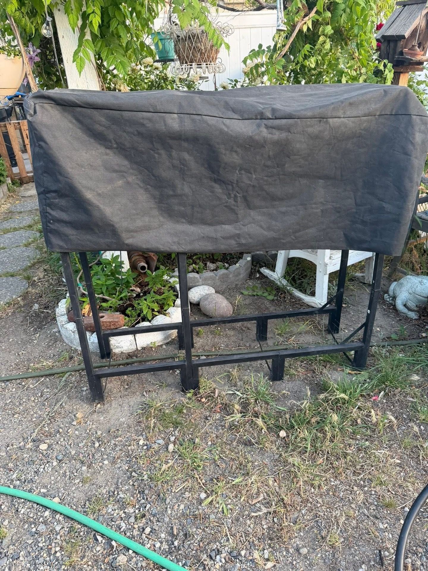 Firewood storage with cover
