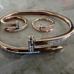 Nail Bracelet and rings. Cartier dupe.