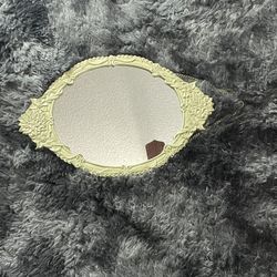 Selling this vintage-style ornate cast iron vanity mirror. Measurements are 18x12”