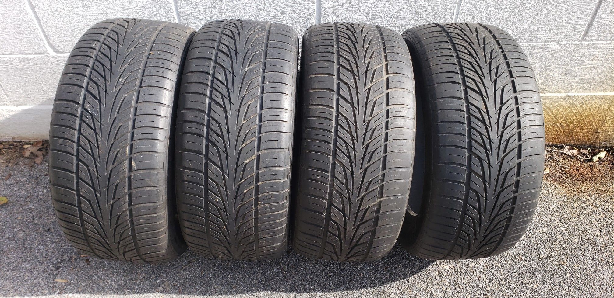 Four 245/50/16 tires