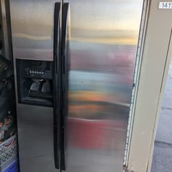 Whirlpool Side by side door fridge