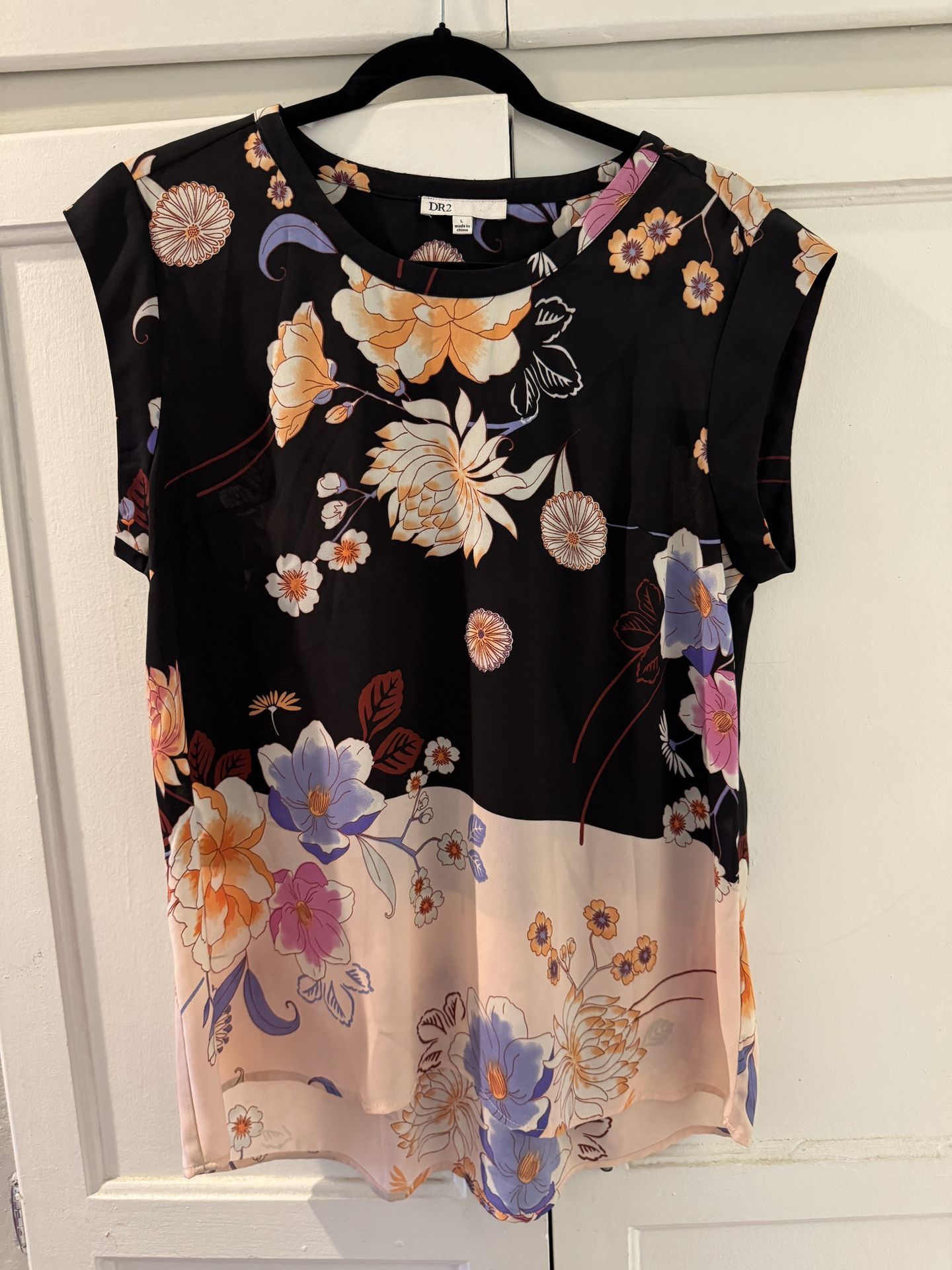 Sleeveless floral tunic top