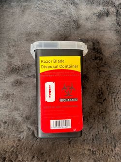 Razor blade disposal container