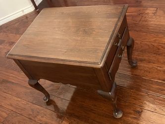 A vintage of solid  wooden small table.  26.5” L x 20” W x 22” H.