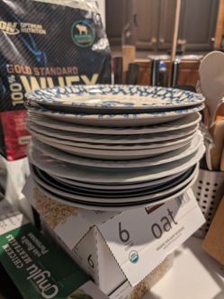 11 blue and white dinner plates, some sets, some pairs