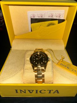 Invicta gold + black dial