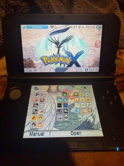 3DS XL, with games